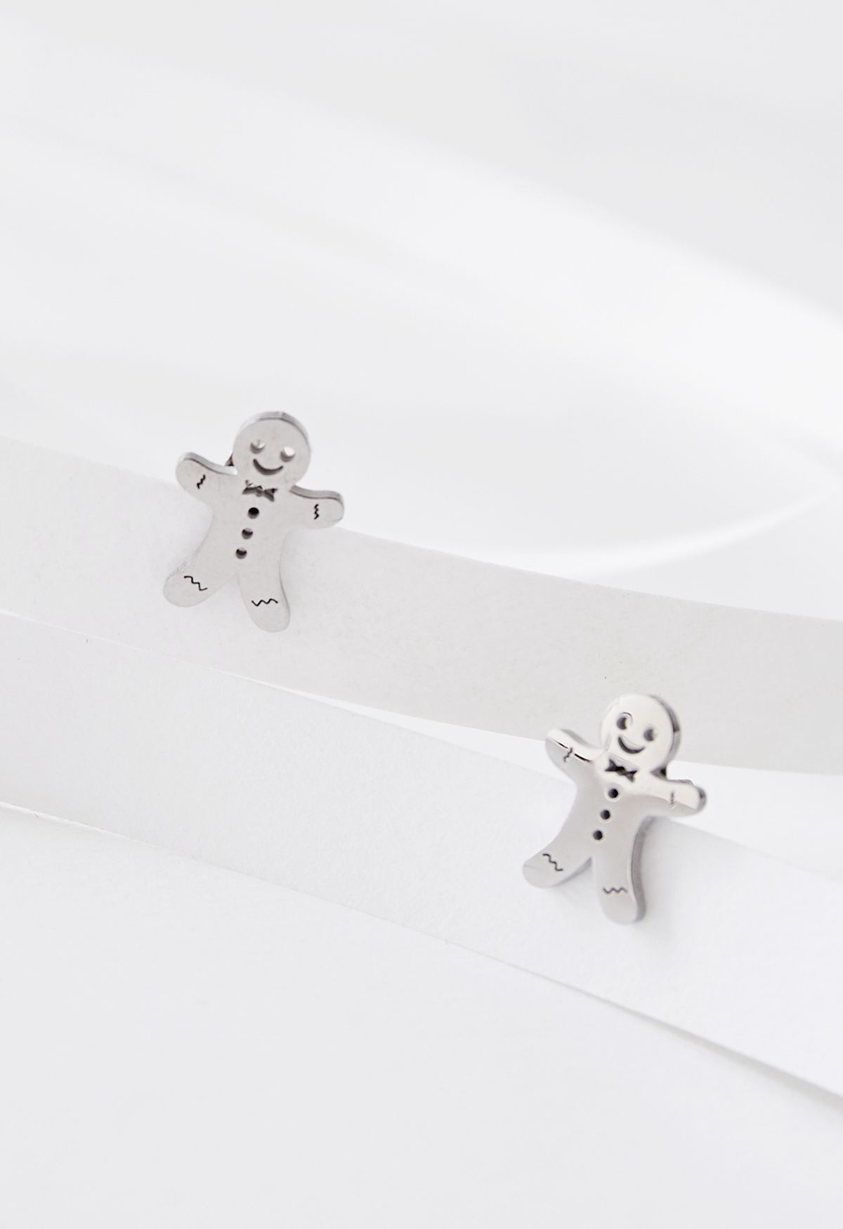 Cute Biscuit Man Earrings in Silver