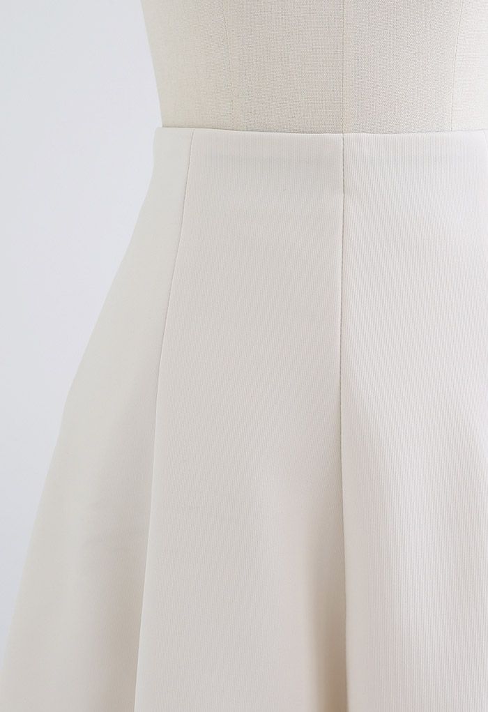 Raw-Cut Hem Flare Mini Skirt in Ivory
