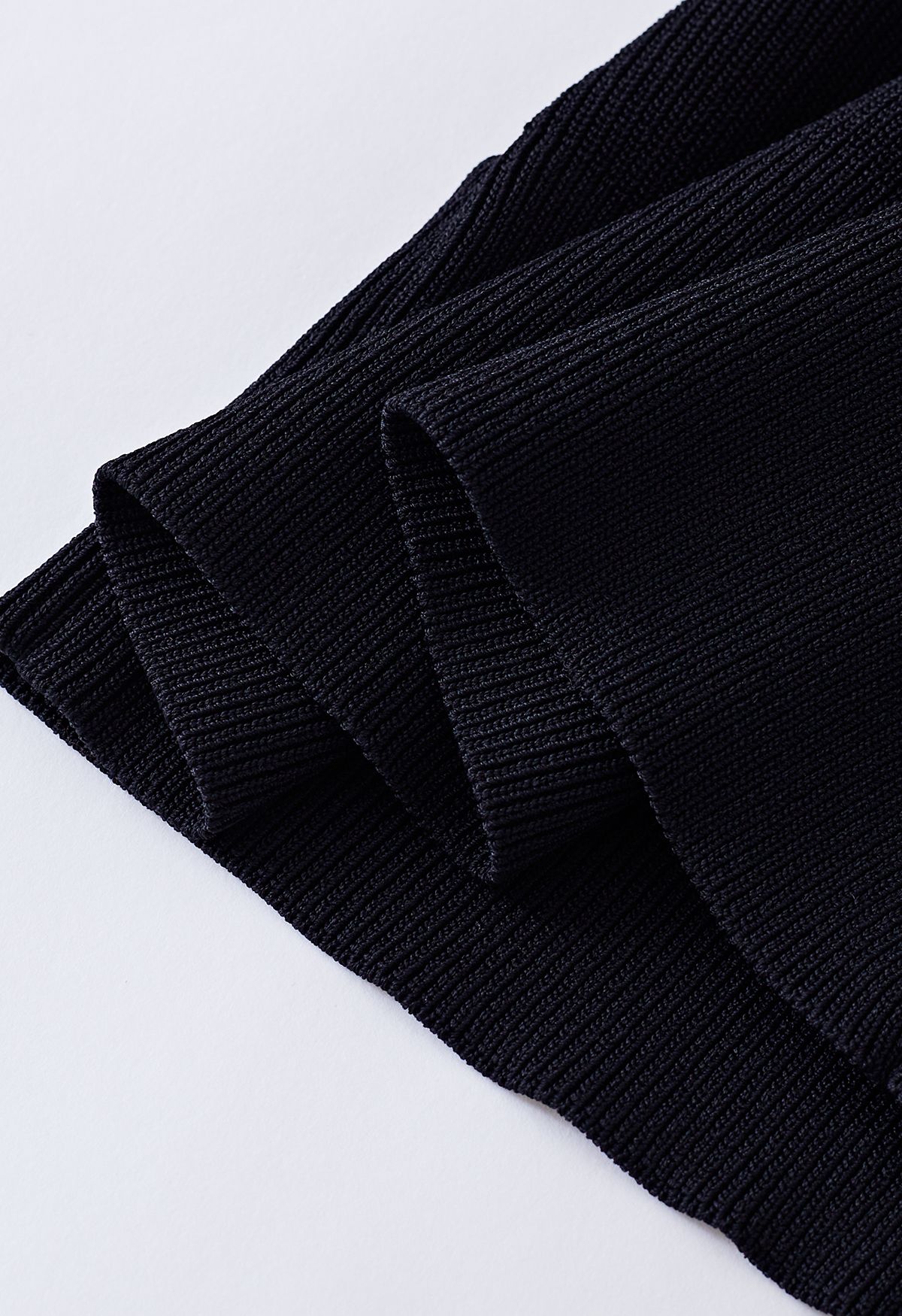 Pearl Puff Sleeve Spliced Faux-Wrap Top in Black