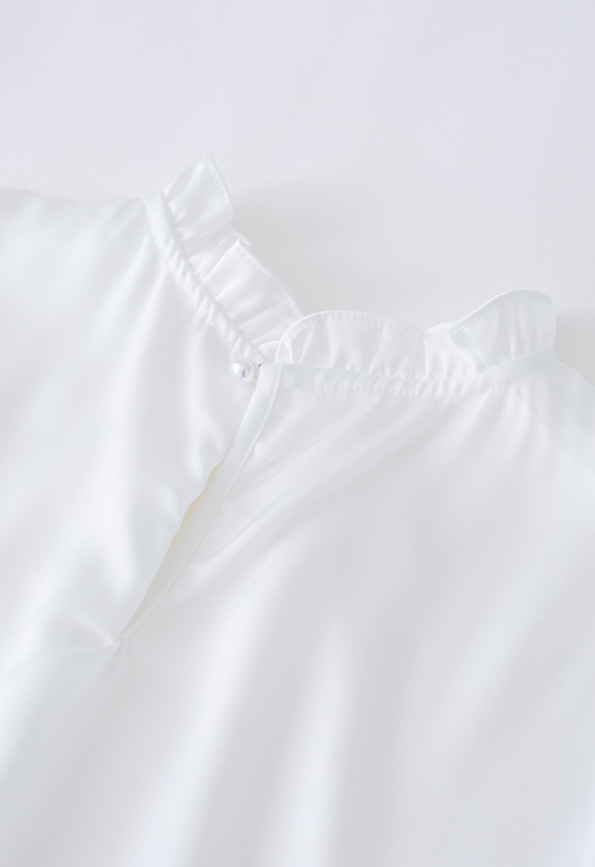 Ruffled Neckline Pearl Embellished Satin Shirt in White