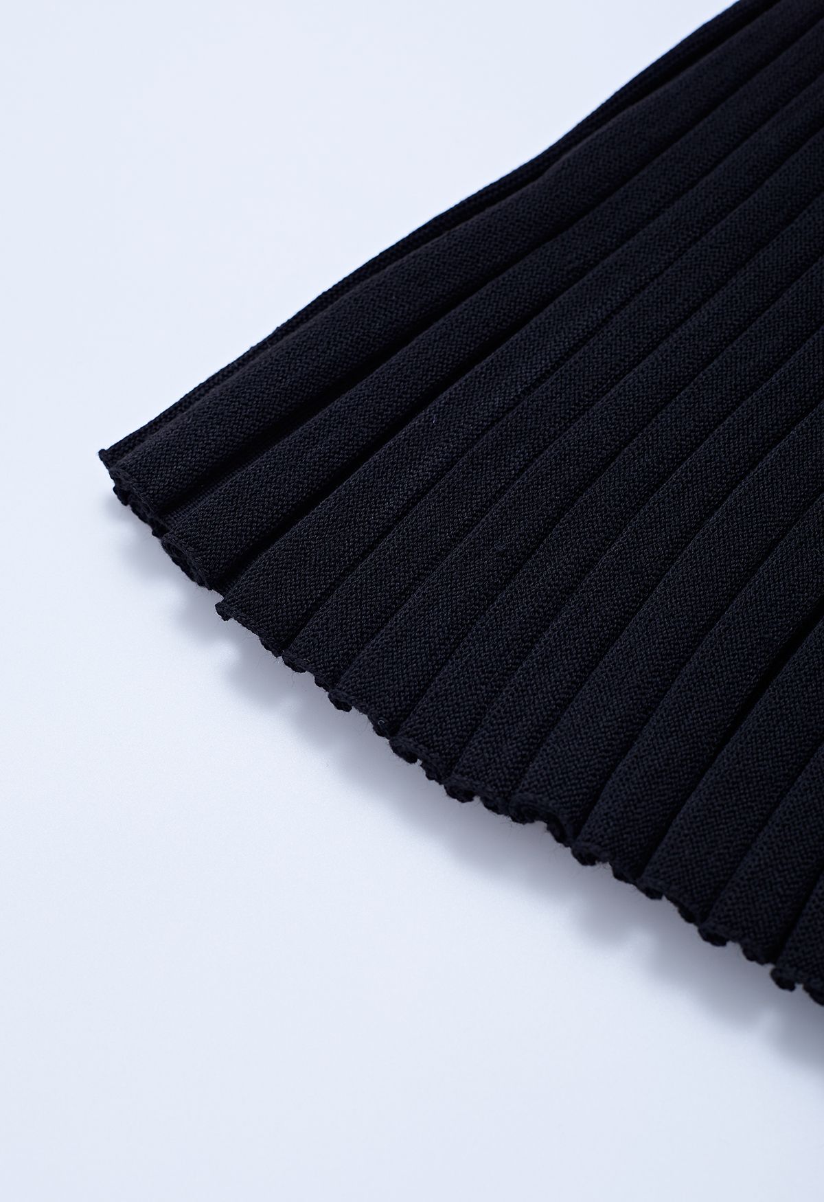Buttoned Front Slit Rib Knit Skirt in Black