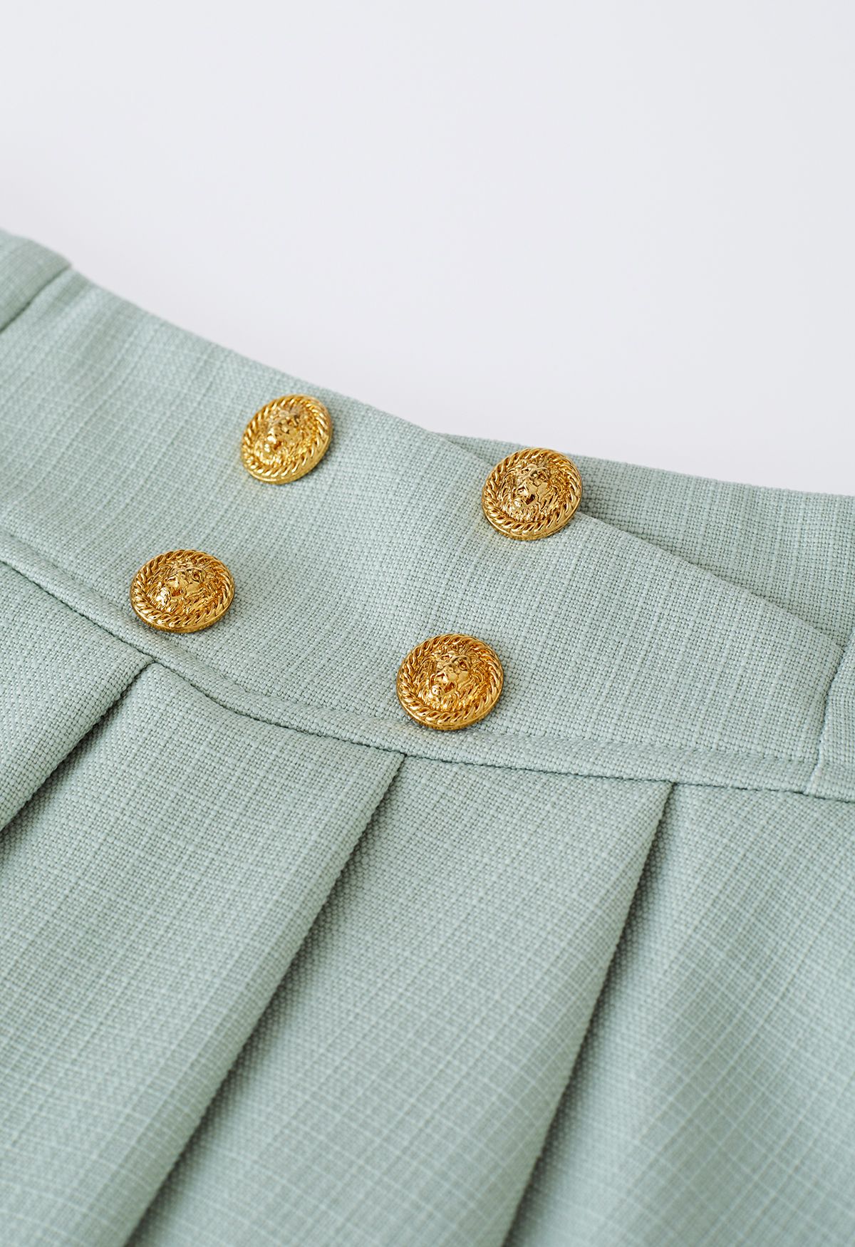Golden Button Pleated Flare Mini Skirt in Pistachio