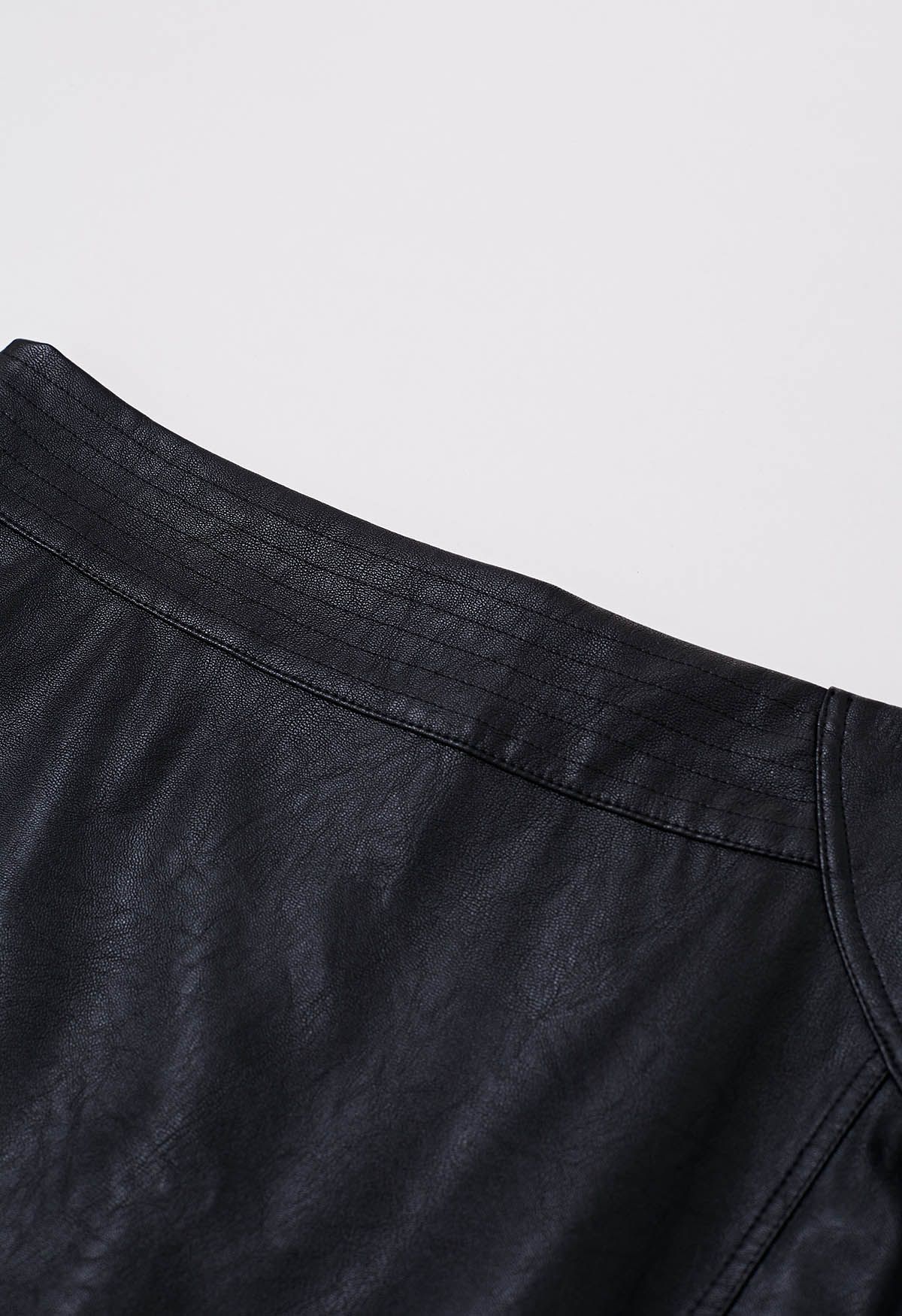 Irregular Hem Faux Leather Mini Skirt in Black