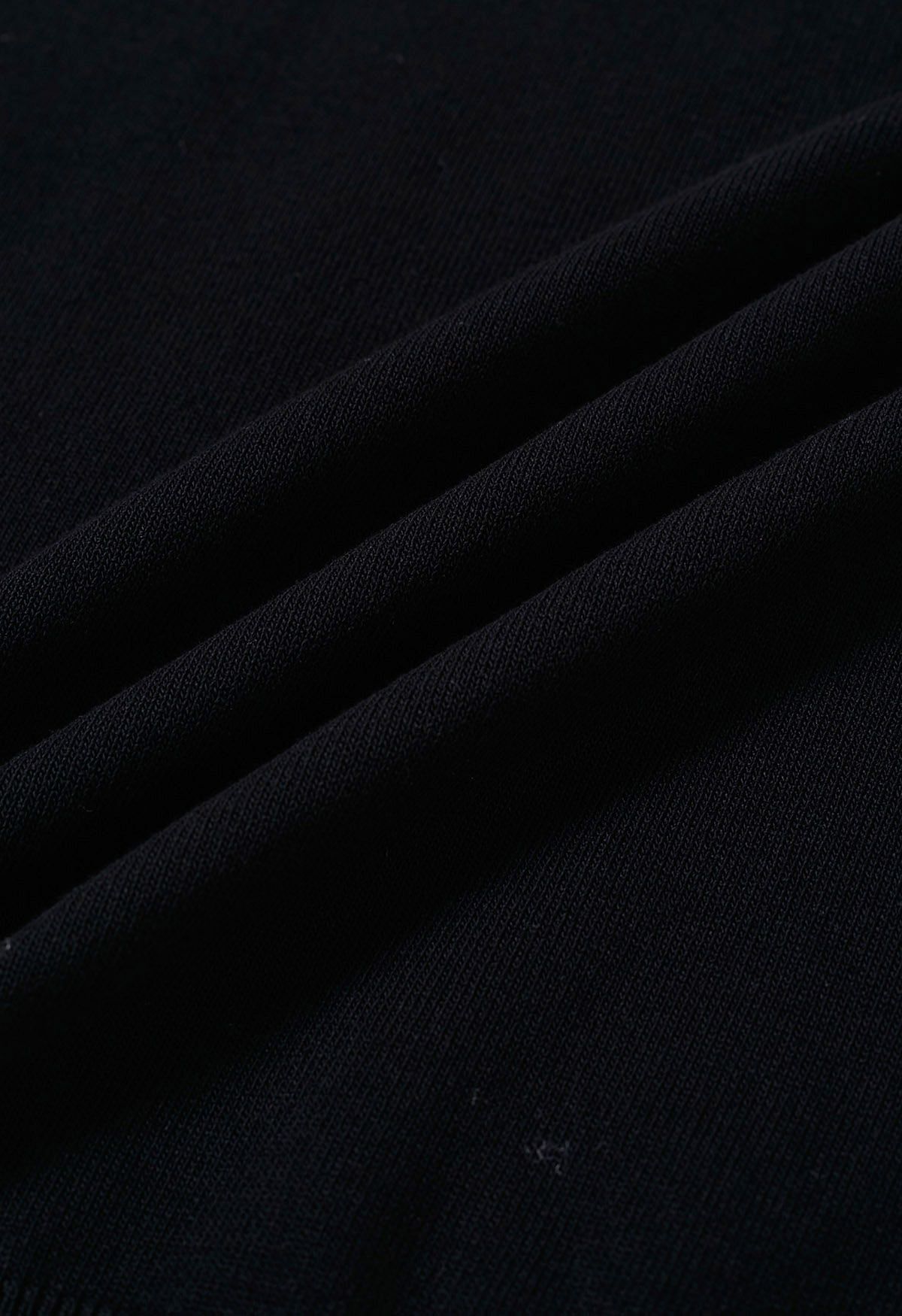Flock Dots Mesh Spliced Knit Top in Black