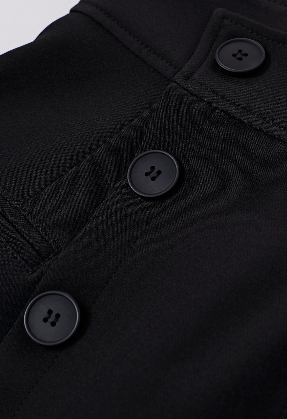 Asymmetric Buttoned Flap Mini Skirt in Black