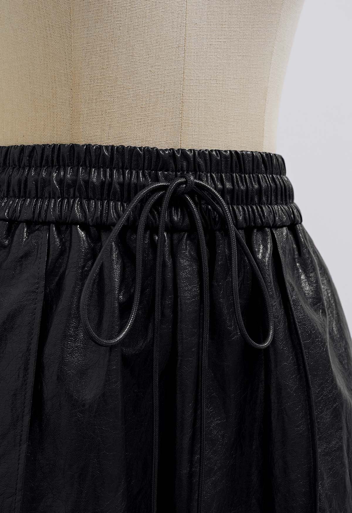 Urban Chic Faux Leather Drawstring Shorts in Black