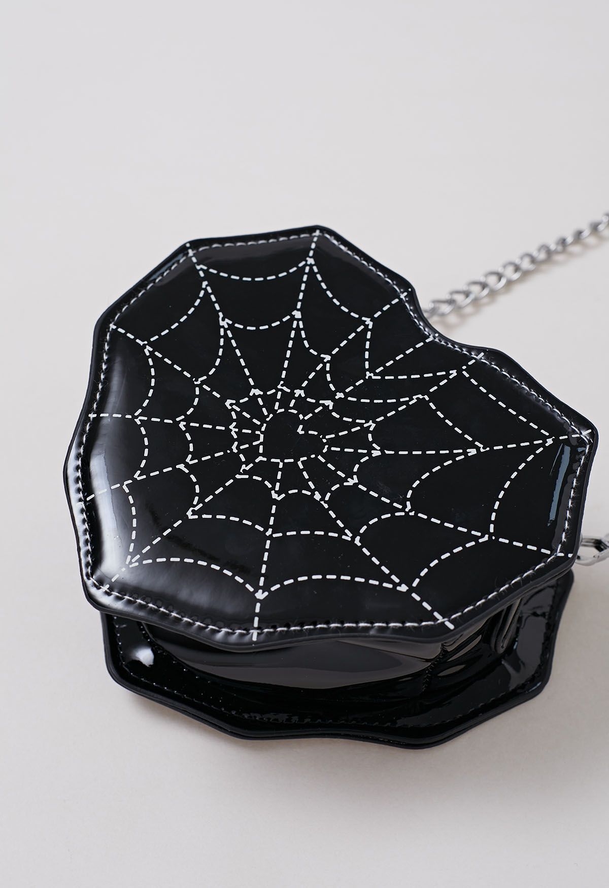 Spider Web Print Heart Crossbody Bag in Black