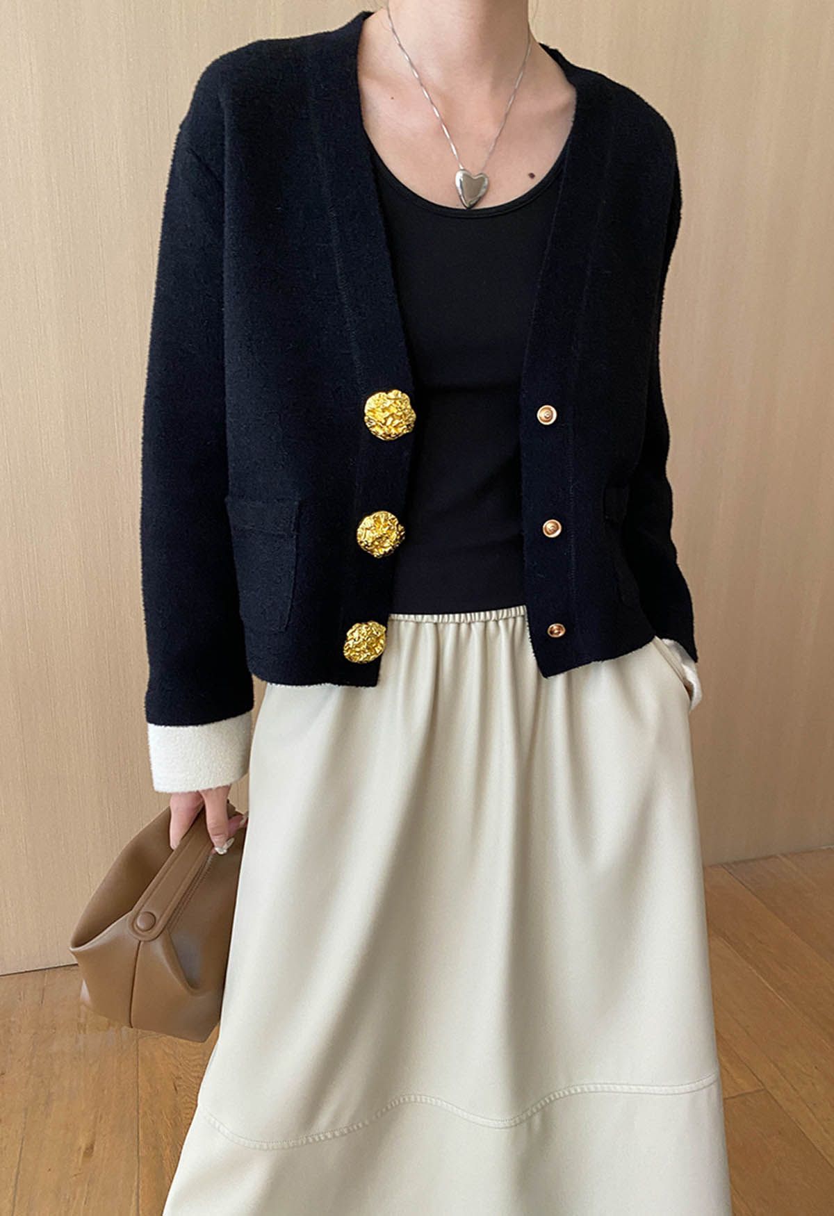 Eye-Catching Golden Stud Button Contrast Knit Cardigan in Black