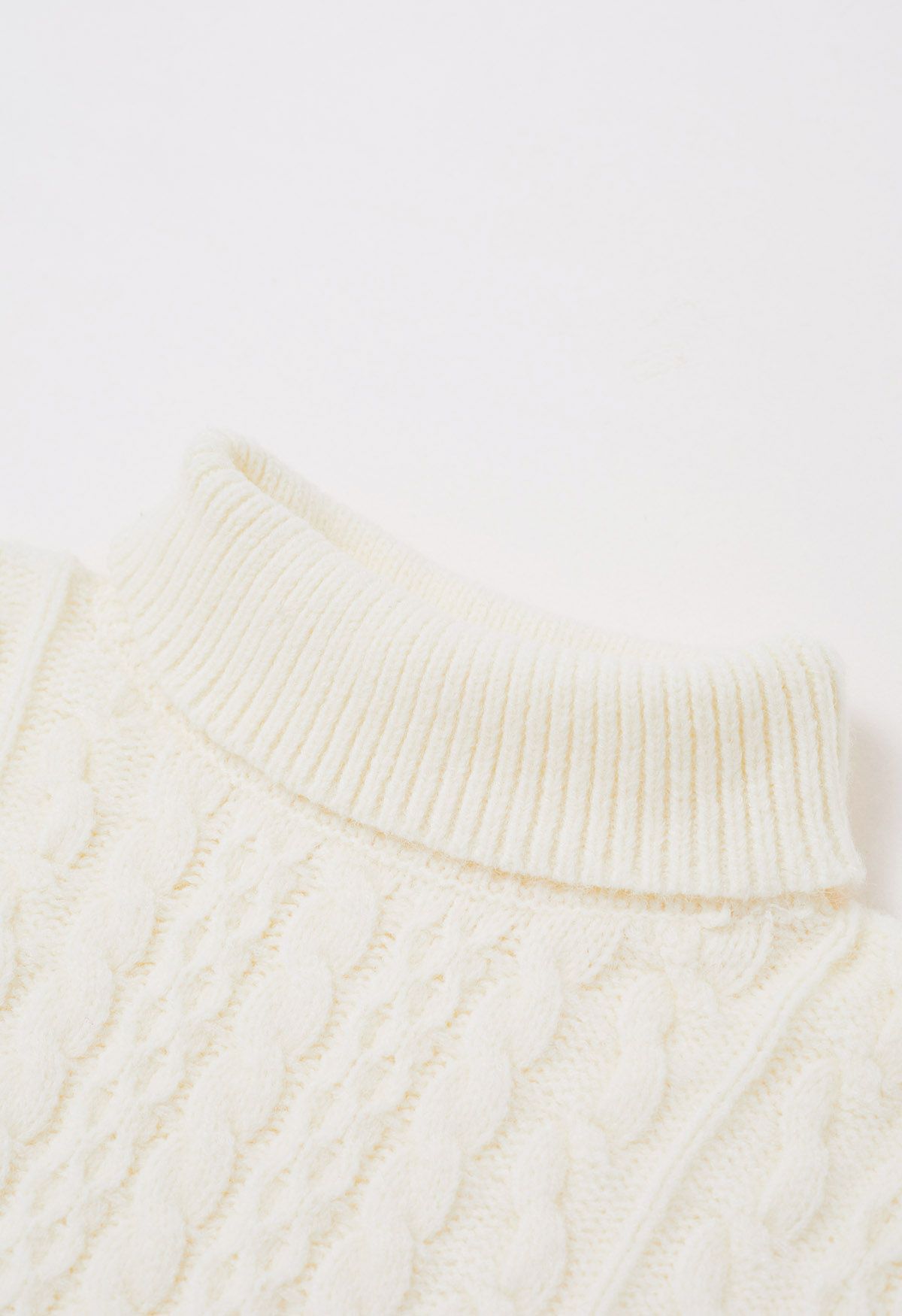 Warmth Turtleneck Cable Knit Cape Sweater in Ivory