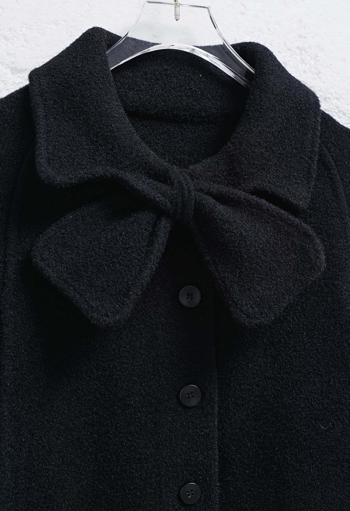 Bowknot Decor Faux Fur Pocket Buttoned Knit Cape Coat in Black