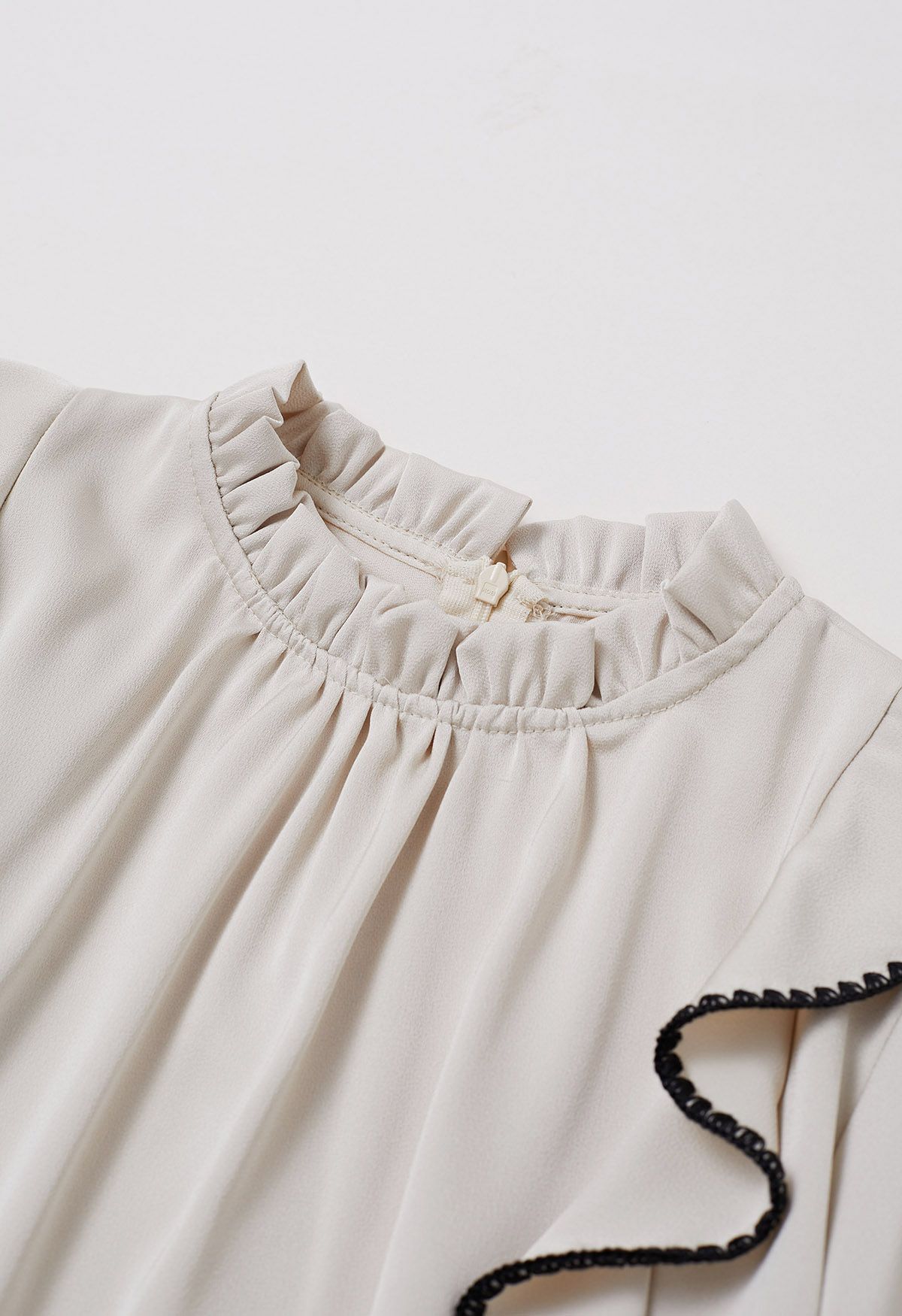 Black Stitch Ruffle Puff Sleeve Shirt in Sand