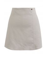 Button Trimmed Faux Leather Mini Skirt in Ivory
